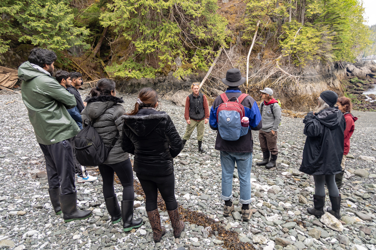 Biologist Matt Peck tells students about East Limestone Island.