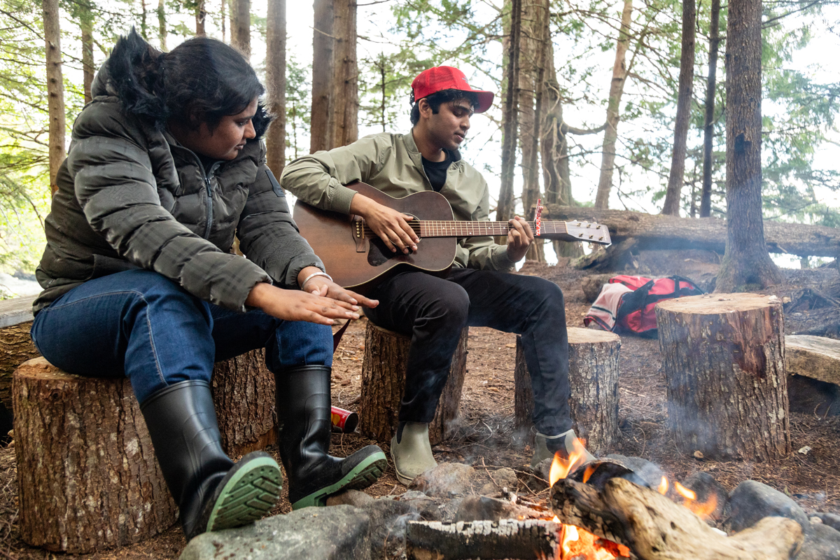 Enjoying some music around the campfire.