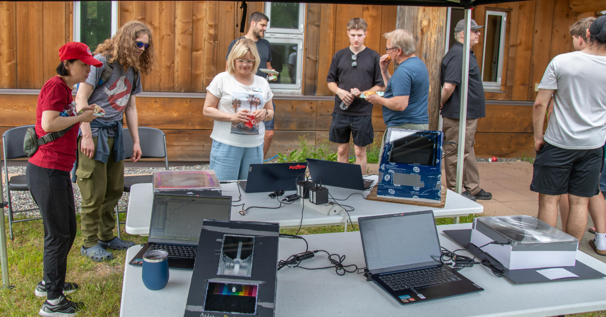 Attendees look at the different model homes during Solar Home Competition