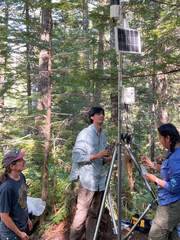 Catharine White, Frank Samnani, and Tierra Perez conducting soil tests.